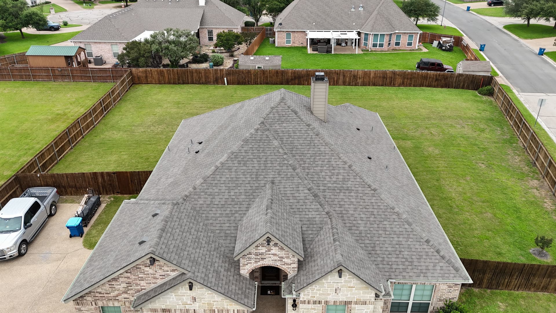 IKO Cambridge Weatherwood Shingle Roof Replacement in Central Texas image