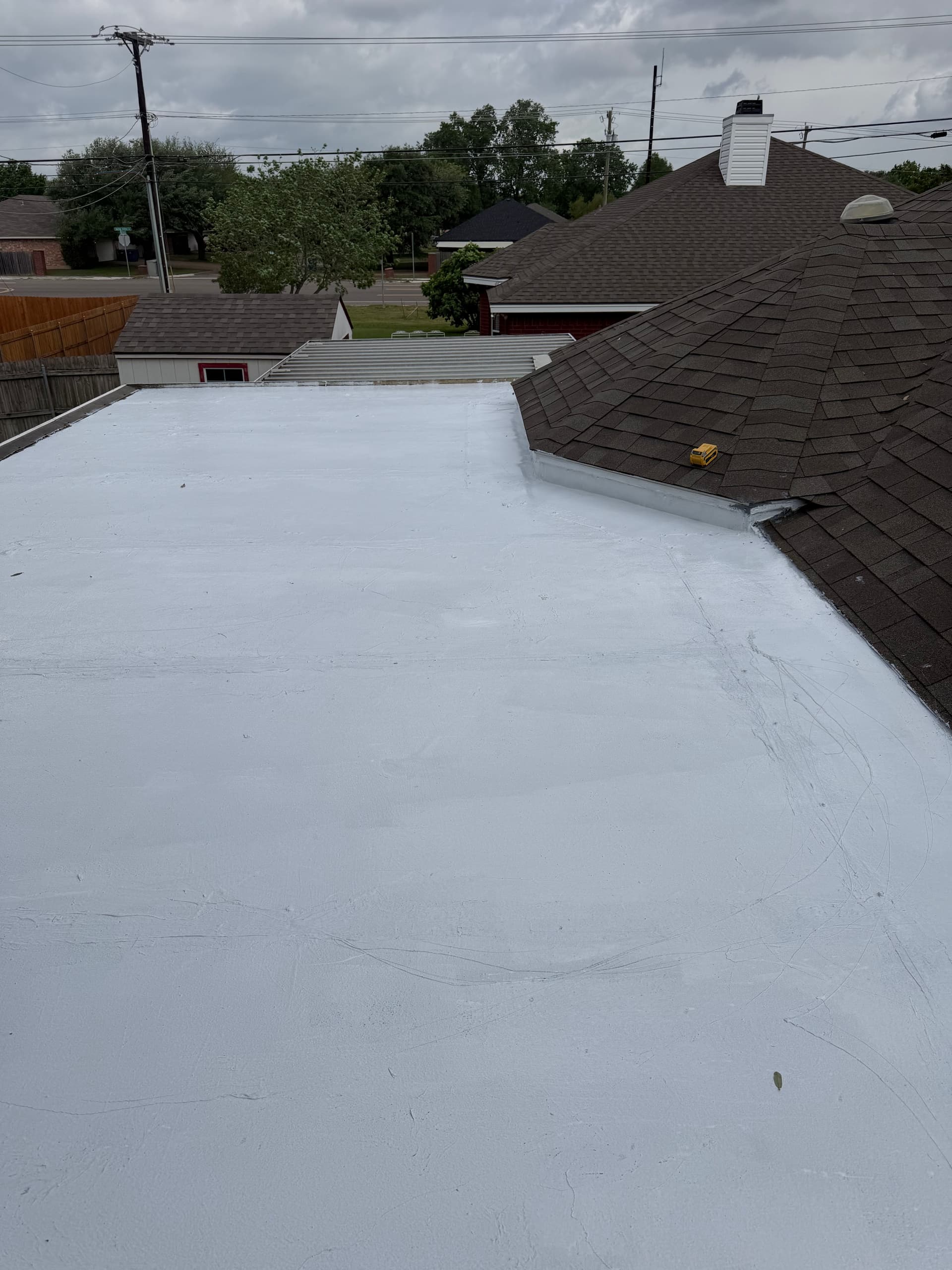 Gallery photos for Silicone Roof Coating Stops a Leaking Flat Roof Cold: Image #1